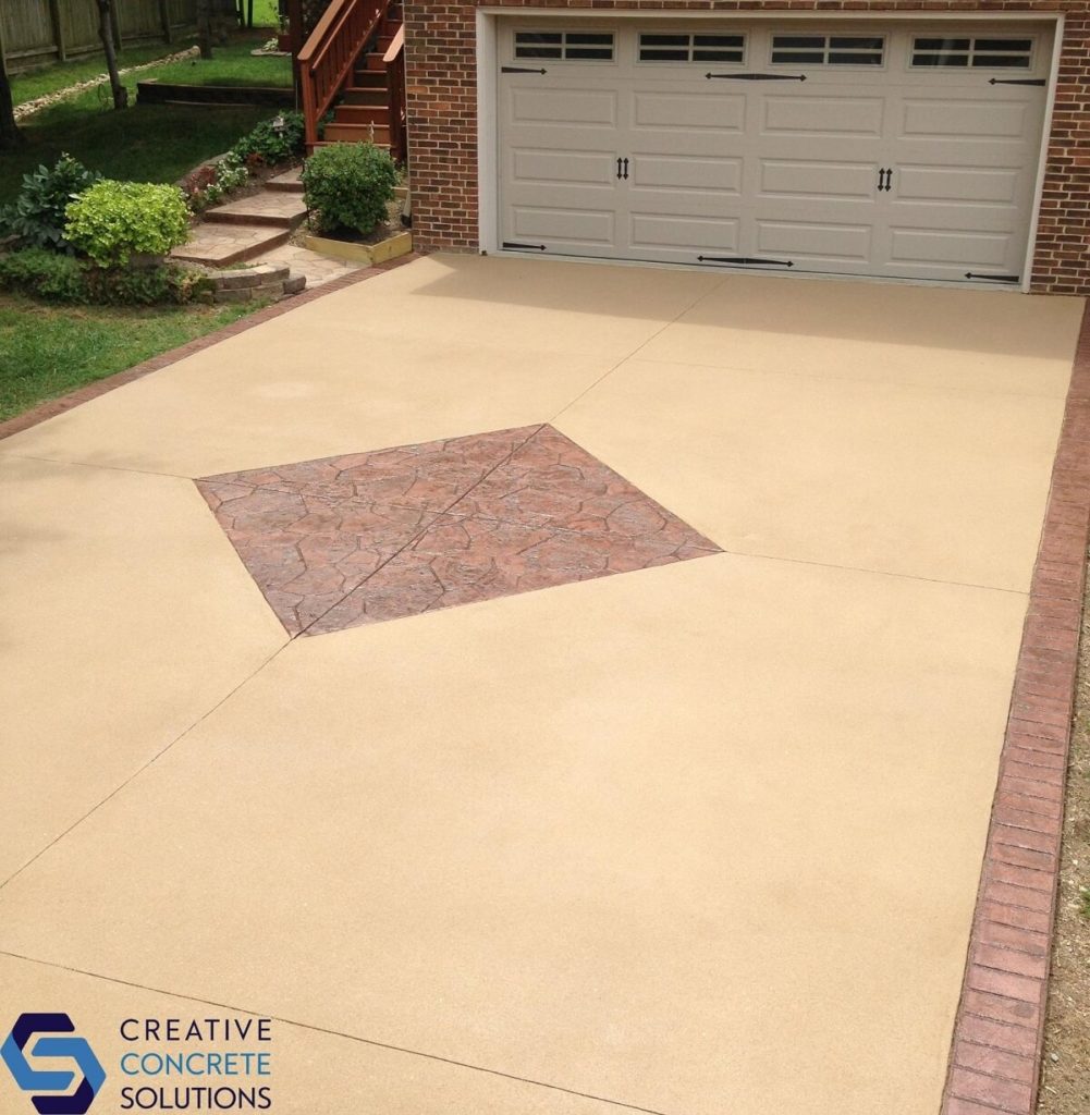 Concrete driveway can be a better alternative than asphalt.