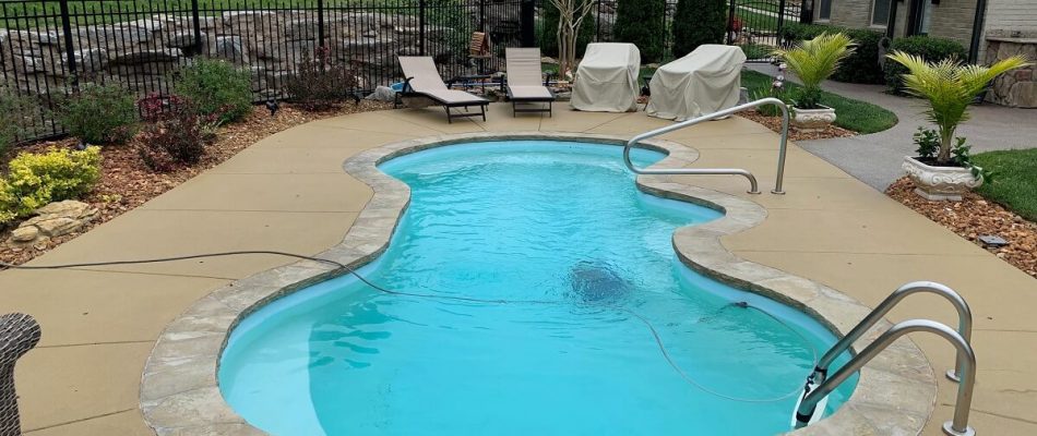 beautiful custom concrete pool deck