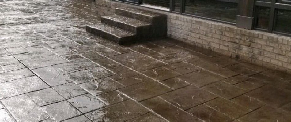 Stamped concrete with rock texture for concrete patios